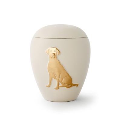 Tierurne aus Keramik mit gold. Hunderelief in Creme