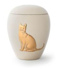Tierurne aus samtener Keramik mit gold. Katzenrelief in cremé