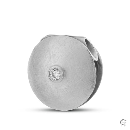 Ascheschmuck aus gebürstetem Material mit leuchtendem Stein